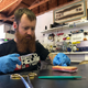 Justin Worst of Grindhouse Wetware practicing suturing.